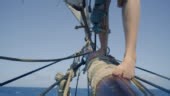 Sailor Walks Along Bowsprit On Tall Ship Grenada