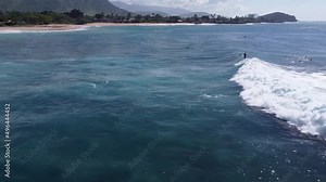 Surf spot Makaha Beach with surfer riding the wave. Oahu, Hawaii travel destination
