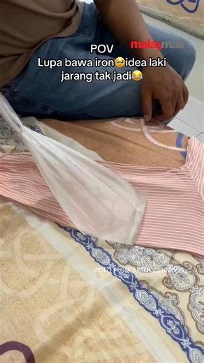 9.8K views · 52 reactions | When his wife forgot the iron, this husband came up with a clever solution — he filled a plastic bag with hot water and ironed his shirt like a pro. | Malay Mail | Facebook