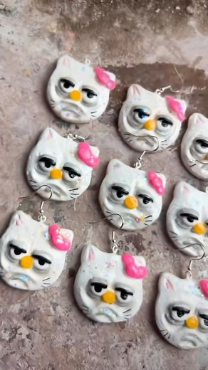 Naomi Minor on Instagram: "Hello Kitty earrings all ready to be worn by you! 🌚🔪 . . . #art #clay #hellokitty #airdryclay #artistsoninstagram"
