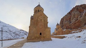 Noravank Monastery in Winter at Sunset – Armenia’s Historic Landmark. A stunning winter view of Noravank Monastery, one of Armenia’s most iconic religious and historical sites