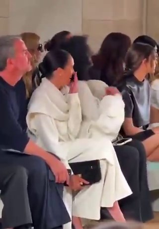 Meghan Markle, self proclaimed supporter of women & global role model for women, laughs at a model slipping during the Balenciaga show she invited herself to