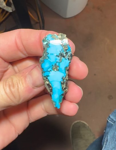 Chunk of Morenci with quarts and pyrite in it. I polished the face of it up a little tonight. I think I’ll finish polishing that face and keep it this way a while. #turquoise #morenciturquoise #pyrite #quartz #specimen | Toby Vanlandingham