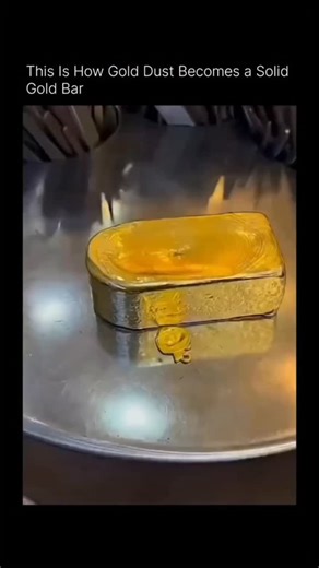 Joy science on Instagram: "You are looking at gold in its most dramatic transformation. It starts as barely-there dust, a glittery powder so fine it behaves almost like smoke. But once you apply extreme heat, over 1,900 degrees Fahrenheit, everything changes. At this temperature, the bonds holding individual gold atoms in place loosen, pushing the metal through a phase change from solid to liquid. In this molten state, gravity and density take over. Lighter, non-metallic impurities, known as sla