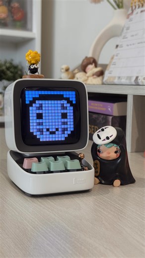 Rie on Instagram: "Unbox the Divoom DitooPro with Hirono 👻✨ This little cutie is perfect for anyone who loves fun tech, retro vibes, and a touch of personality on their desk. From the stunning pixel art display and mechanical keyboard clicks to the good sound quality and fun built-in games, this one is sure to brighten any desk space! 🤍 Thank you so much @divoom_global for sending this through! I’ve always wanted one, and you’ve definitely made my 2026 a lot happier! ✨ . . . #divoom #divoomspe