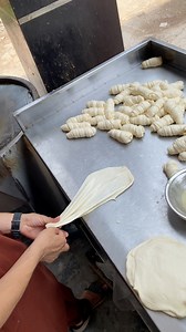 790K views · 413 reactions | Master’s hands turning simple dough into pure art #roll #bread #satisfyingsounds #fyp | StreetEats18 | Facebook