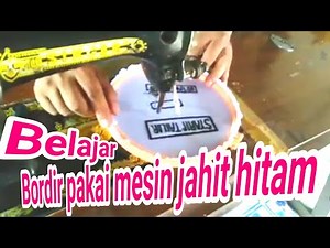 Bordir manual pakai mesin hitam