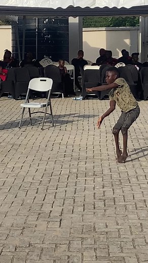 Young Boy's Impressive Acrobatic Performance Outdoors