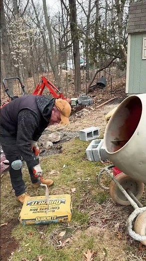 Best way to split 80lbs concrete bag in half