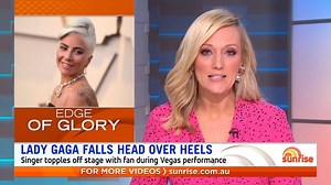 Watch the moment Lady Gaga tumbled off stage with a fan who picked her up during a show 😲 | Sunrise