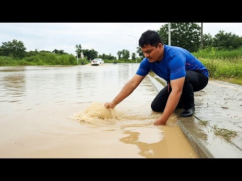 Remove Leaves Clogged Culvert - Check Culvert System On Street For Drain Water