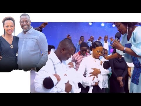 Pastor Joseph Buyungo and Pastor Josephine Buyungo dedicating their beautiful triplets