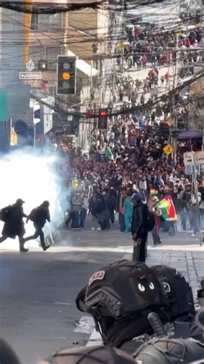 Police in Bolivia used tear gas against protesters in La Paz as they marched against the government’s decision to end fuel subsidies that had kept domestic prices far below international levels. The move has doubled gasoline prices and tripled the cost of diesel. | Al Jazeera English