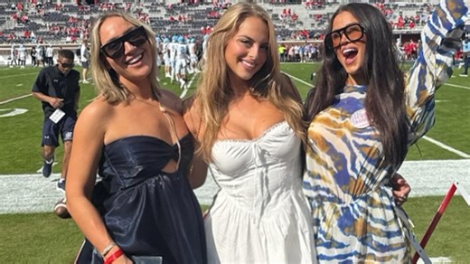 CBS star Claudia Bellofatto turns heads in sideline outfit alongside friends