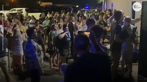 Health care workers met by protesters at a school board mask meeting