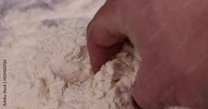 white wheat flour on the table, an ingredient for making bread and other products white wheat flour