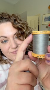Use this little hack to keep all your stray threads behaving as they should be! #threadspool #threadstorage #sewingroom #sewinghack #learntosew #thread | She Sews Seams