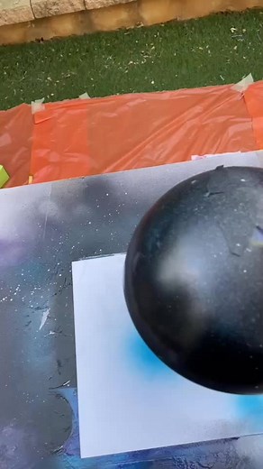 Creating Galaxy Art on Canvas with Spray Paint