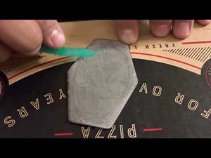 Using E6000 to Glue a Leather Patch on a Hat.