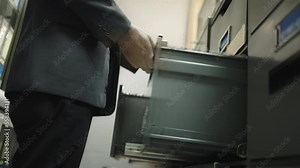 Important documents in files business documents are placed in a filing cabinet in the office.