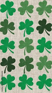 Vertical video - Saint Patrick's Day background animation: green shamrocks on traditional Irish linen fabric. This textured pattern motion background is full HD and a seamless loop.