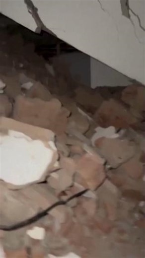 TRIGGER WARNING: Claustrophobia WATCH: A teenage girl captured a chilling video on Saturday, March 29, 2025 as she, her sister, and their grandmother were trapped in the rubble of their earthquake-damaged apartment building in Mandalay, Myanmar. The footage showed the two sisters alongside their injured grandmother, whose face was covered in blood, squeezed into a small space amid the rubble of the collapsed Sky Villa condo. Surrounded by debris and fallen walls, they waited anxiously for rescue