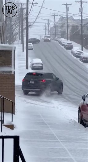 Icy Roads Cause Widespread Sliding After Overnight Winter Storm in North Carolina Video recorded in North Carolina shows vehicles struggling to maintain control on icy roads after a winter storm moved through the area overnight. The footage captures cars sliding across lanes and having difficulty stopping as frozen patches linger into the morning hours. Officials urged drivers to slow down and use caution, noting that refreezing conditions can make roads especially hazardous even after snowfall 