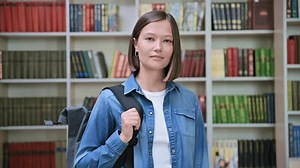 Female University Student Backpack Inside Library Stock Footage Video (100% Royalty-free) 1107531201 | Shutterstock