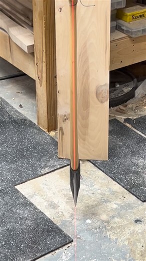 Using the axe as a plumb bob and a self leveling laser to check handle and bit alignment.#castermanaxes | Casterman Axe and Tool Company