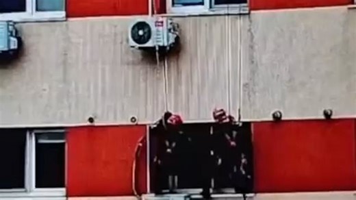 Dramatic footage shows police abseiling down block of flats to free barricaded woman