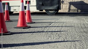 Road maintenance work cone static closeup. Roadworks signs on a street. Roadworks sign on a road