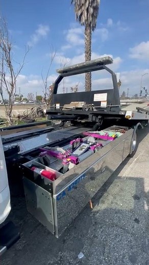 Fully automatic flatbed f-550 tow truck