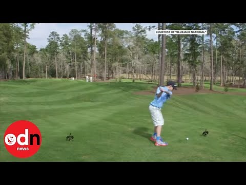 A brave boy hits a hole-in-one in front of Tiger Woods