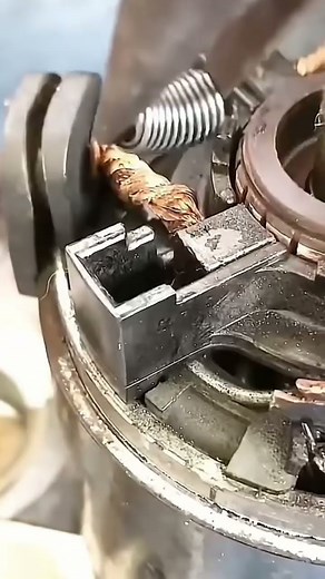 the process of inserting a spring into its place properly and correctly#youtubeshorts