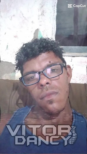 Curly Hair Enthusiast in Blue Tank Top