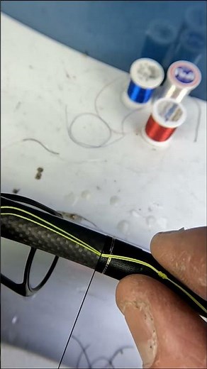 Tying a fishing rod guide with a simple spiral inlay