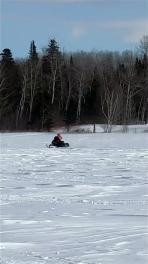 Snowmobile Race on the Frozen Lake: Epic Speed and Thrills! #shorts
