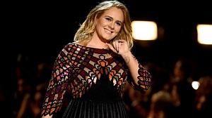 Adele postpones Las Vegas residency in tearful video