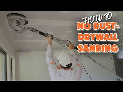 Sanding with an electric drywall vacuum sander