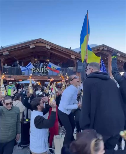 “In Courchevel, France, Ukrainians and Russians came together, dancing to a song by the rock band ‘Leningrad.’ They drank, danced on tables, and waved their national flags in a rare moment of unity.” #Russians #Ukrainians | Russian Australian Cultural Centre - Vera