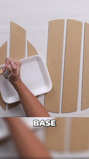 Creating a faux-stained dark brown look with MDF is easier than you think! Paint a base coat, then dry brush on black and dark brown in layers. The more layers, the more it looks like aged wood. Keep adding until you are happy with the result! #fauxstain #woodlook #DIYpainting #MDFprojects #paintingtechnique https://thecraftyblogstalker.com/laser-cut-wood-door-hanger-free-svg/ | The Crafty Blog Stalker | Facebook