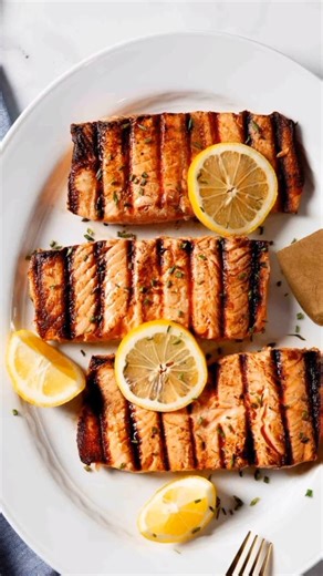 This Easy Grilled Salmon is my favorite way to get dinner on the table fast. It’s flavorful, flaky, and comes out perfect every single time. You don't even need any sauces. ✨ Comment "recipe" and I'll send you the recipe ✨ Google " grilled salmon " ✨ FREE Ebook - Top 10 Dinner Recipes: https://chewoutloud.kit.com/ebc3358c17 #grilledsalmon #healthygrilling #quickrecipe #grilledseafood #weeknightgrill | Chew Out Loud