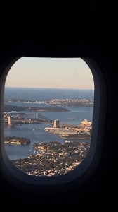 It's official, #Sydney is the dream city. 💙 Whether you're visiting or returning home, watching the sun bathe the city skyline will never get old. Thanks for sharing your #feelnewsydney moment IG/vagner.karyna ID: Sydney Harbour and the city's skyline from a plane window in Sydney, Australia. | Sydney.com