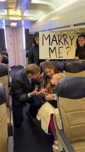 Pilot proposes over intercom! ❤️ Pilot proposes to his girlfriend mid flight using the intercom system to surprise her and the help of friendly passengers in this sweet story of love in the sky. #couplegoals #couple #flight #family #plane #viralvideo #blessed #proposal | Jamie and Blake