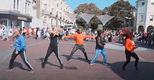 Dancers Perform Incredible '80s-Themed Flash-Mob In Seaside Town