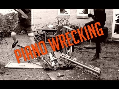 Smashing Piano with Sledgehammer