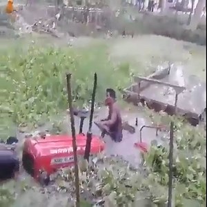 Tractor wears stuck in the mud Cre: Channel Machinery | Channel Machinery