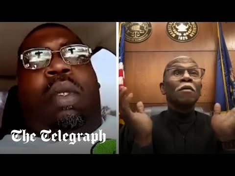 Driving without a licence defendant joins court case call - while driving his car