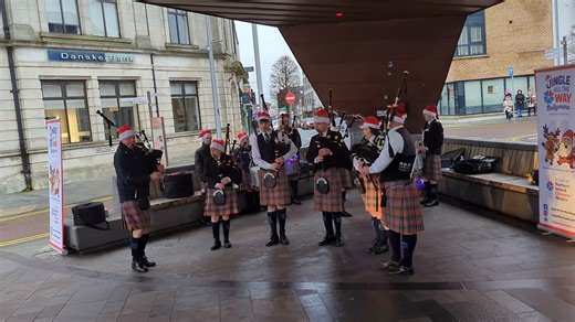 The powerful Highland Cathedral performed by the Cullybackey Pipe Band at the Jingle All the Way - Ballymena event in aid of Northern Ireland Children's Hospice | We Love Pipe Bands