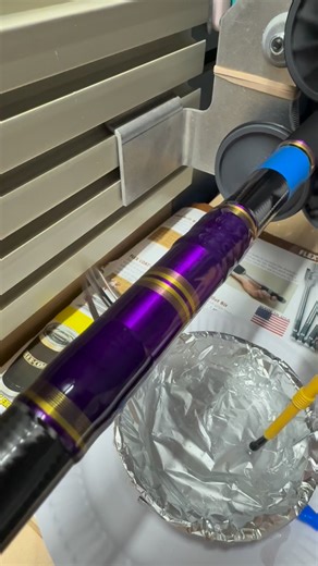 Rossco McKay on Instagram: "Coating underwrap final coat 💦 Purples & Gold 🎣 Titanium Guides ☑️ Feel free to follow and comment 🤝🎣🎣 #threads #art #fishing #fyp"